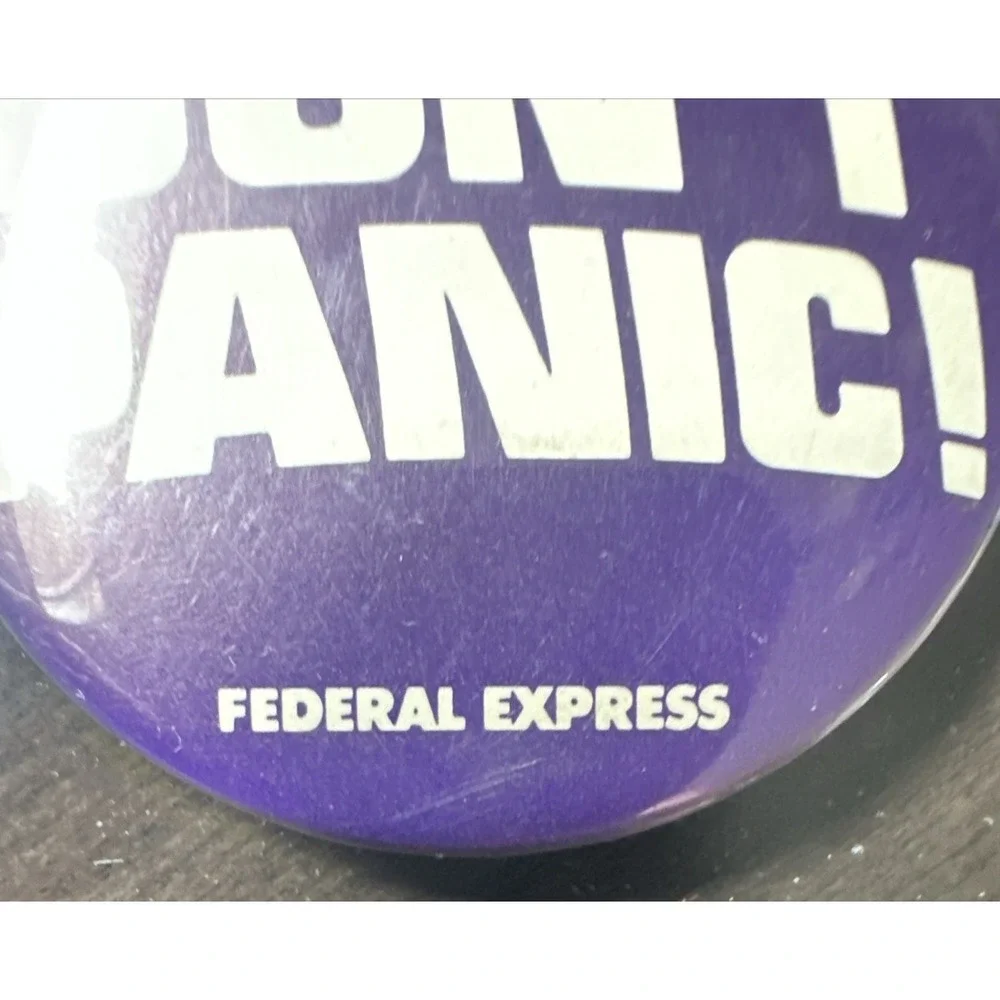 Vintage Federal Express DON'T PANIC! Transport Advertising Pin Back Button FedEx